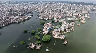 UP : यूपी में बाढ़ का विकराल रूप! 26 जिलों में 3.53 लाख लोग प्रभावित, बलिया के 48 गांव पानी में, आज फिर बारिश का अलर्ट